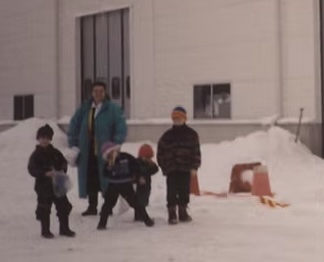 Michael and Signhild with their children outside the SnackCo facility